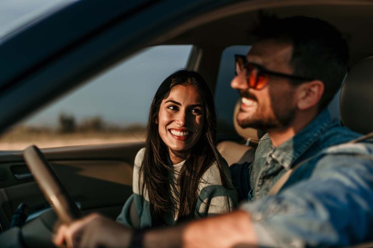 Paxonway car rental couple driving